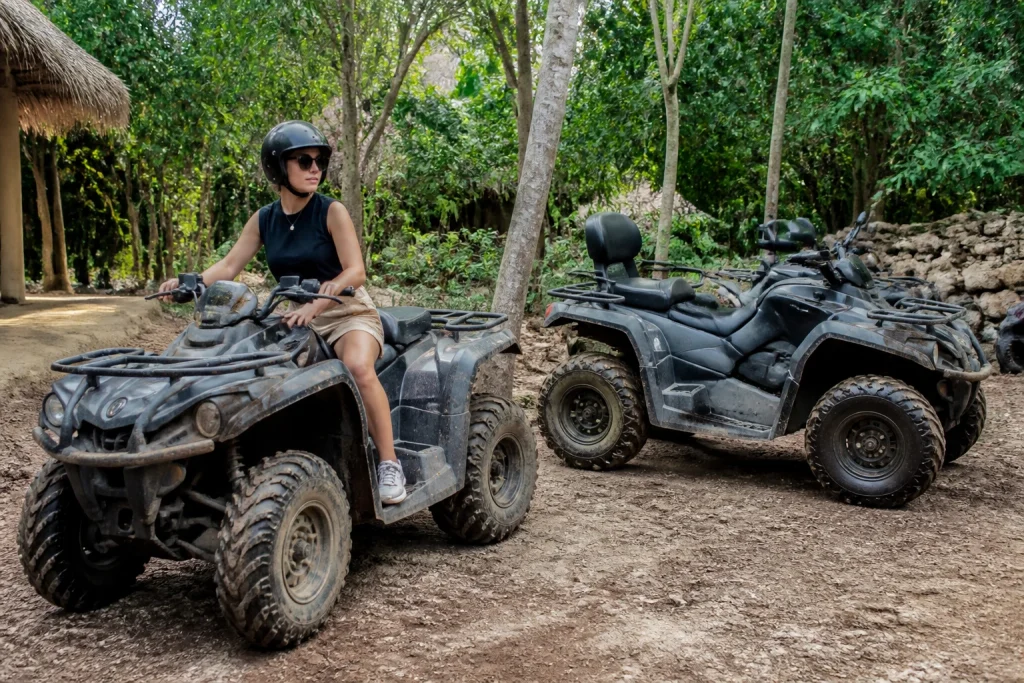 Single and shared ATVs at a Cancun jungle adventure base