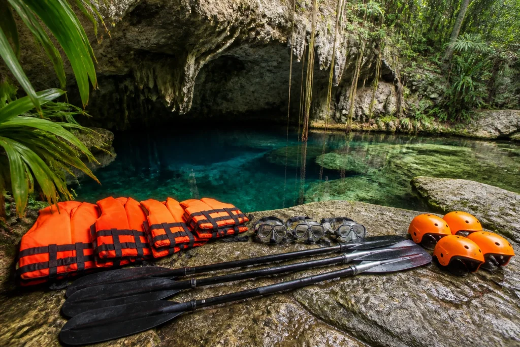 Cenote tour equipment arranged beside the water