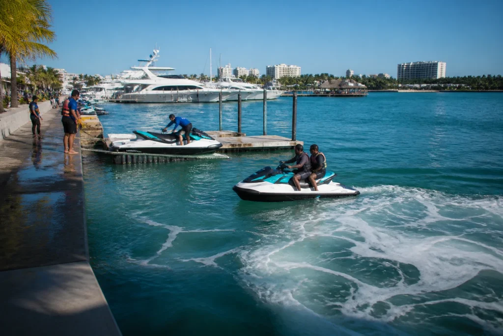 Personal watercraft beside a marina dock in Cancun